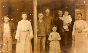 William Chesley Wrenn Family William Chesley is holding
Hassie Elizabeth and Martha Philpott is standing to Williams left.
